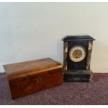 A black slate and marble mantel clock together with a walnut travel writing box