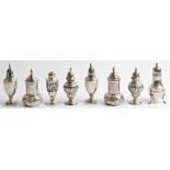 A collection of hallmarked silver pepperettes, to include three pairs and two singles, (some