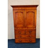 A Victorian mahogany linen press with two long and two short drawers to base.