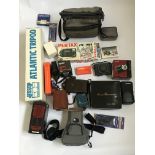 A collection of camera equipment. IMPORTANT: Online viewing and bidding only. Collection by