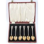 A set of six silver Sir Winston Churchill teaspoons in a red case.