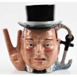 A Staffordshire Fine Ceramics character jug of Sir Winston Churchill, with a detachable Homburg hat,