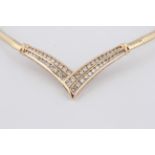 A diamond necklace, the cross over design panel set with 50 graduated round brilliant cut