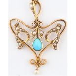 An Edwardian reconstituted turquoise and seed pearl pendant, set centrally with a pear cut