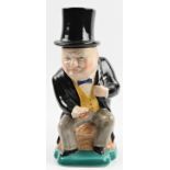 A Kirkland pottery Toby jug of Sir Winston Churchill smoking a cigar with a detachable top hat. BOOK