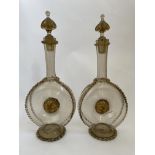 Two Italian glass decanters with a gold coloured lion to centre and a gold coloured pattern BOOK A