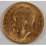 A George V 1913 Sovereign. BOOK A VIEWING TIME SLOT ON OUR WEBSITE FOR THIS LOT. IMPORTANT: Online