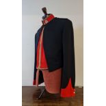 A navy blue and red military mess jacket and waistcoat, uniform of Brigadier Brian Thomas RMP.