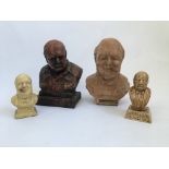 Four busts of Sir Winston Churchill, to include one cigar lighter bust, one red bust with no