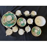 An early Worcester approx 29 tea set with floral design on green background. BOOK A VIEWING TIME