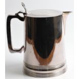 An Elkington silver plated tankard style jug, lion engraved to lid, approx. height 19cm. BOOK A