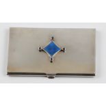 A silver and enamel card holder, featuring central diamond shaped blue enamelled motif with facetted