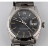 A stainless steel gents Rolex Oyster Perpetual Date wrist watch, the blue dial having hourly baton