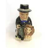 Large 9” Toby Jug of Winston Churchill seated On the left is the British Lion and on the right is