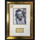 A photograph of singer and comedian Gracie Fields (1898-1979) with signature underneath, with