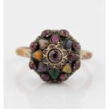 A tiered multi-gemstone cluster ring, stamped 14k, ring size N½. BOOK A VIEWING TIME SLOT ON OUR