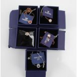 SWAROVSKI. Five Swarovski pendants/necklaces of various designs, all boxed. 5279425, 5279421,