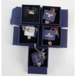 SWAROVSKI. Five Swarovski pendants/necklaces of various designs, all boxed. 5272365, 5272364,