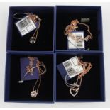 SWAROVSKI. Four Swarovski pendants/necklaces of various designs, all boxed. 5351305, 5349962,