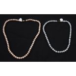 A string of peach cultured pearls, clasp stamped 375, length approx. 20", together with a string