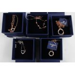 SWAROVSKI. Five Swarovski pendants/necklaces of various designs, all boxed. 5368540, 5353520,