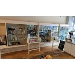 A large wall display unit made up of six sections - one open and the other five with lockable