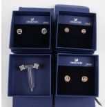 SWAROVSKI. Four sets of Swarovski earrings of various designs, all boxed. 5364218, 5289026, 5289032,