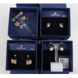 SWAROVSKI. Four sets of Swarovski earrings of various designs, all boxed. 5358058, 1116357, 5358058,