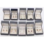 Ten boxes of earrings. BOOK A VIEWING TIME SLOT ON OUR WEBSITE FOR THIS LOT. IMPORTANT: Online