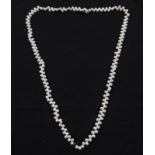 A double strand of cultured pearls, comprising pear drop shaped pearls, clasp stamped 375, length