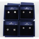 SWAROVSKI. Four sets of Swarovski earrings of various designs, all boxed. 5098511, 5396227, 5364218,