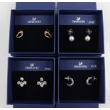 SWAROVSKI. Four sets of Swarovski earrings of various designs, all boxed. 5123883, 5390189, 5389161,