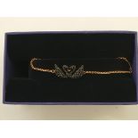 SWAROVSKI. Swarovski bracelet/bangle of swan design, boxed. 5344132 IMPORTANT: Bidding via the-