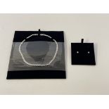 SWAROVSKI. A Swarovski necklet and earring set, boxed. 5007747. IMPORTANT: Bidding via the-