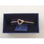 SWAROVSKI. Swarovski bracelet/bangle of heart design, boxed. 5368541 IMPORTANT: Bidding via the-