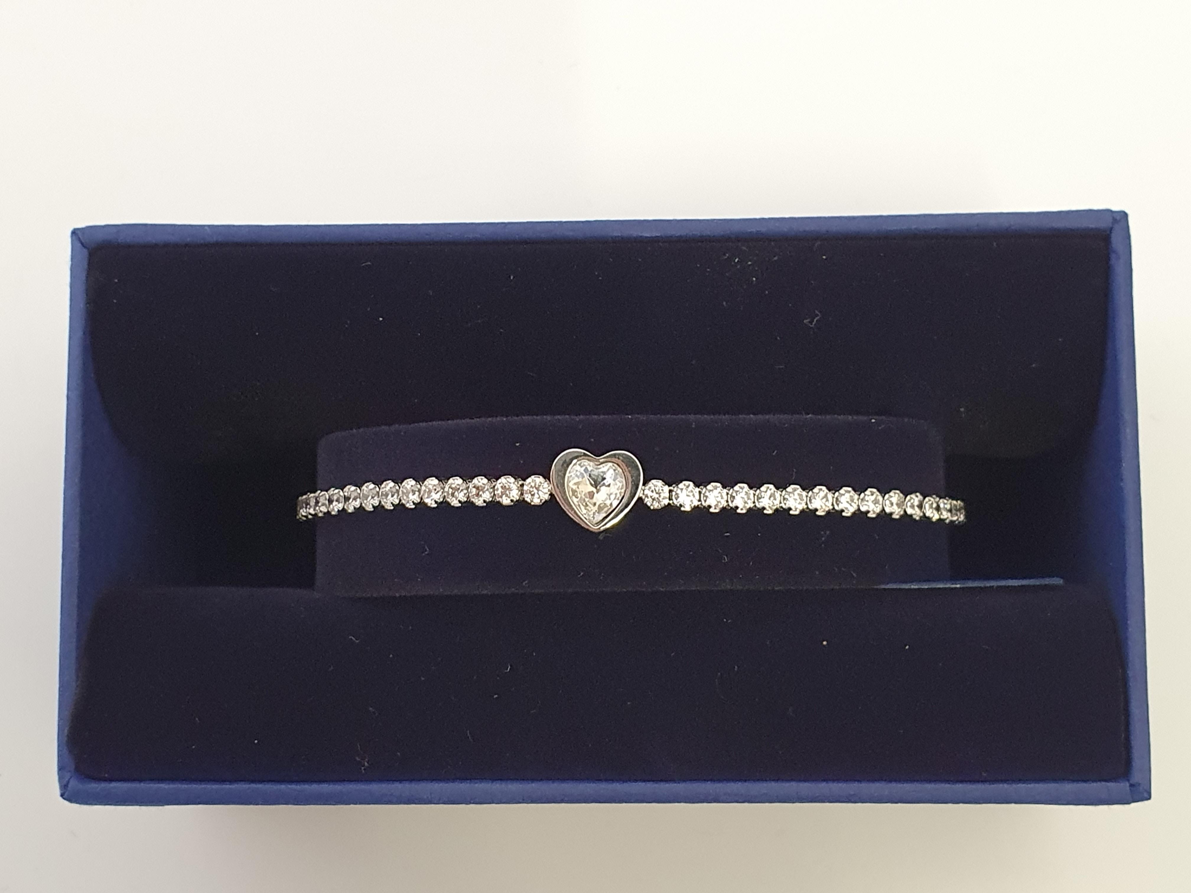 SWAROVSKI. Swarovski bracelet/bangle of heart design, boxed, 5349630 IMPORTANT: Bidding via the-