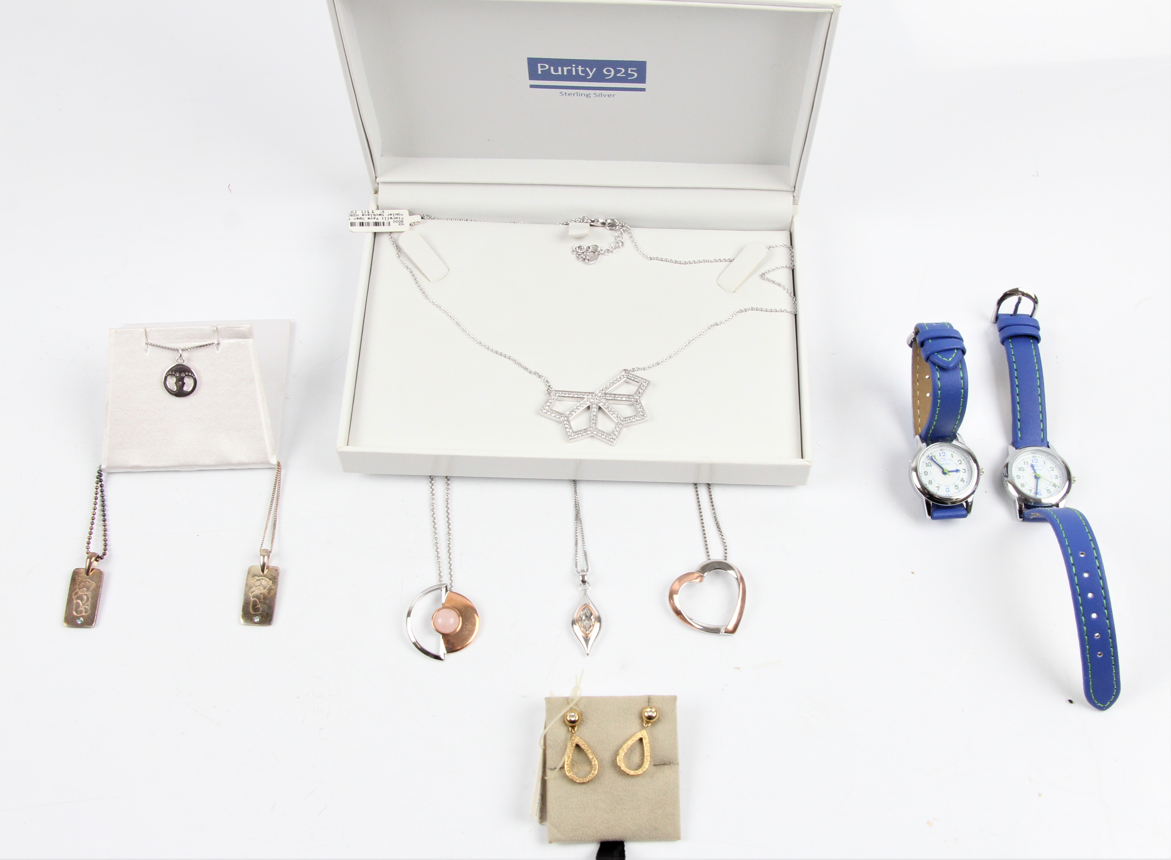 Four FIORELLI necklaces, SKAGEN earrings, D FOR DIAMOND pendant and two watches. IMPORTANT: