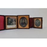 Three tin types of gentlemen, young lady, and two children in embossed cases.