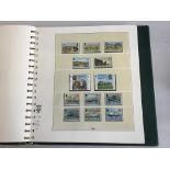 A comprehensive collection of mint Isle of Man stamps 1973 to 2015 in four albums. Includes