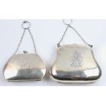 Two hallmarked silver evening bags with engraved monograms.