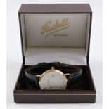 A hallmarked 14ct yellow gold cased gents J.J. Rudell wrist watch, the white dial having hourly