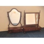Two mahogany 19th century swing toilet mirrors fitted with drawer to base.