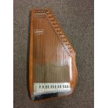 An Autoharp by Oscar Schmidt.