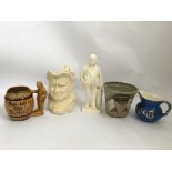Three jugs to include an Embassy Ware Winston Churchill jug together with a wall pocket planter with