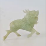 A Chinese jade / jadeite carved figure of a horned beast.