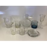 A collection of Sir Winston Churchill glassware to include a glass toasting goblet, a round