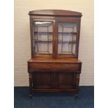 A converted Victorian mahogany upright piano converted to desk/cabinet.
