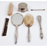 A hallmarked silver dressing table set, to include a jewellery box, a mirror, a clothes brush, a