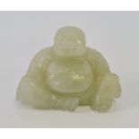A Chinese jade / jadeite carved figure of a Buddha.