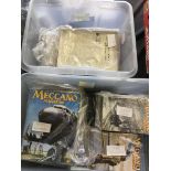 Two plastic boxes containing a quantity of Meccano magazines from 1925 to the 1950s